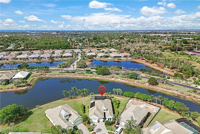 aerial view featuring a water view and a residential view