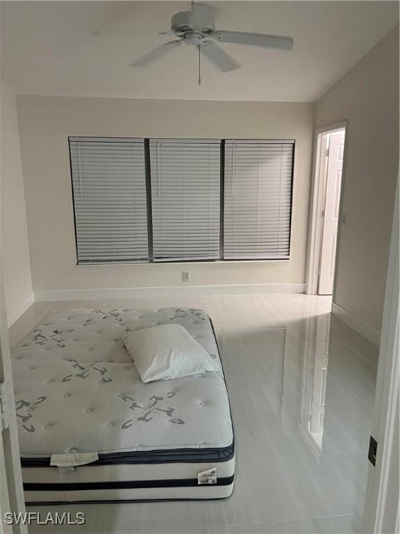 bedroom featuring ceiling fan