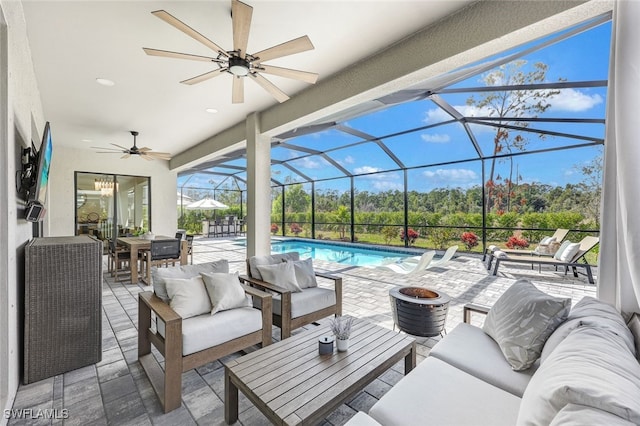 view of patio with ceiling fan, an outdoor hangout area, and a lanai