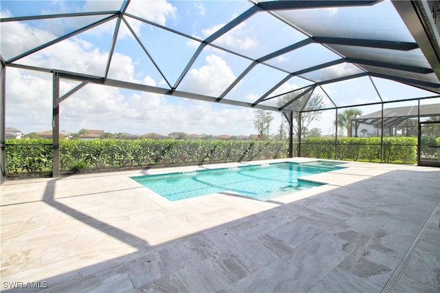 view of pool featuring a patio and a lanai