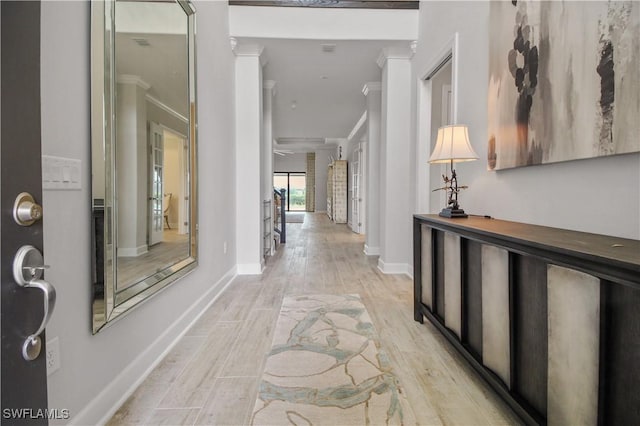 corridor featuring light hardwood / wood-style flooring