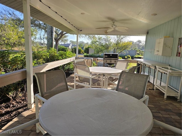 view of patio featuring ceiling fan and grilling area