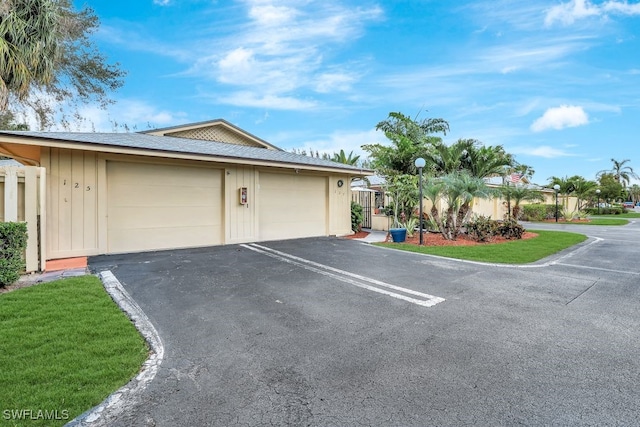 exterior space with a garage