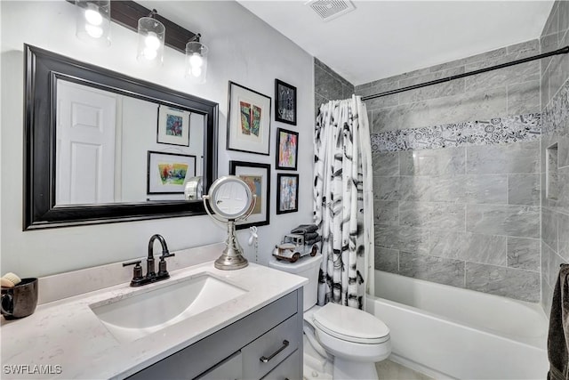 bathroom with toilet, visible vents, shower / tub combo with curtain, and vanity