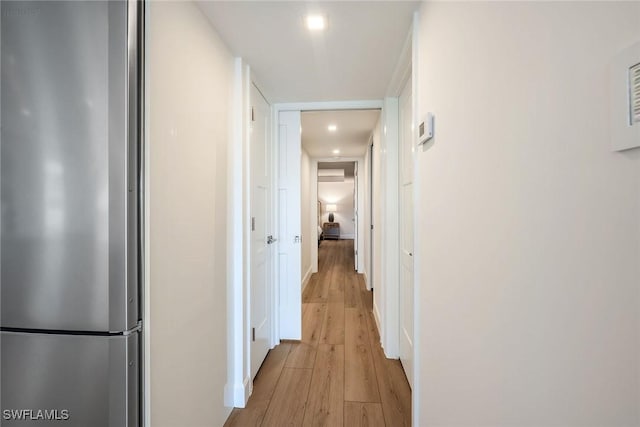 hall featuring light wood-style floors