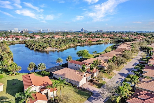 aerial view with a water view and a residential view