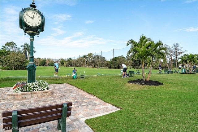 5548 Foxhunt Way, Naples, FL 34104 - surrounding community with a yard