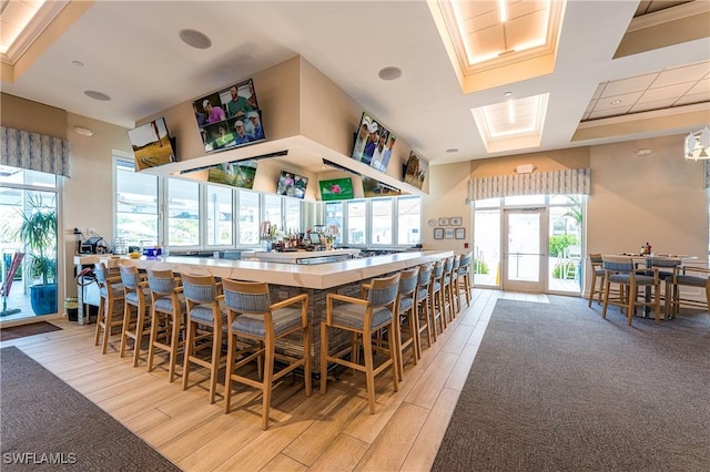 5548 Foxhunt Way, Naples, FL 34104 - bar area with light wood finished floors