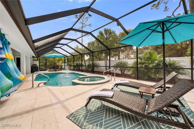5548 Foxhunt Way, Naples, FL 34104 - view of swimming pool featuring a pool with connected hot tub, a patio area, and a lanai