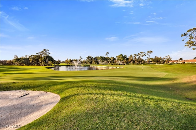 5548 Foxhunt Way, Naples, FL 34104 - view of community with a water view, a lawn, and view of golf course