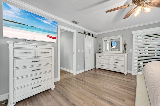 5548 Foxhunt Way, Naples, FL 34104 - bedroom with baseboards, light wood finished floors, ornamental molding, and ceiling fan