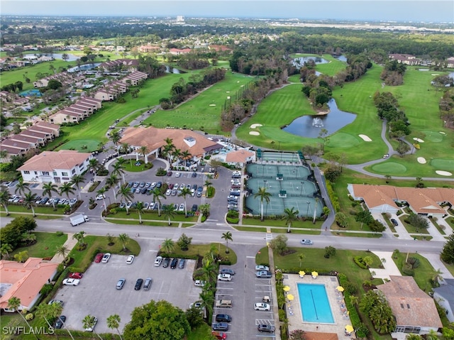 5548 Foxhunt Way, Naples, FL 34104 - aerial view of property's location with a large body of water, a golf course, and nearby suburban area