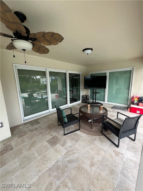 view of patio / terrace featuring an outdoor living space and a ceiling fan