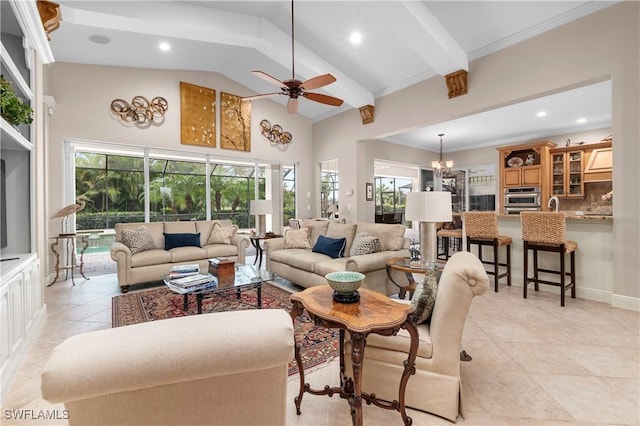 living room featuring high vaulted ceiling, light tile patterned floors, plenty of natural light, and ceiling fan with notable chandelier