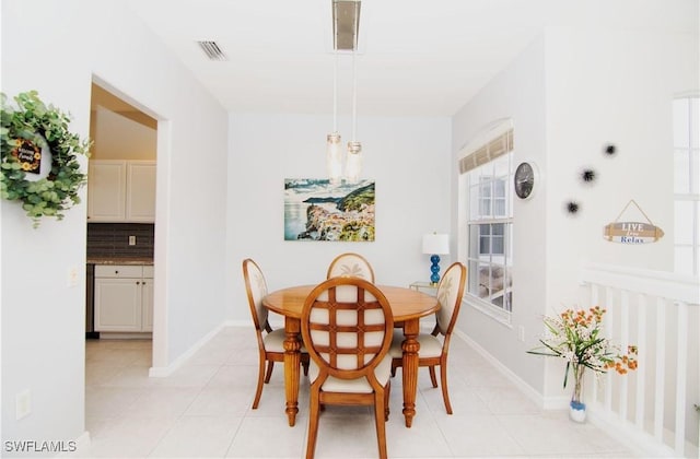 10007 Sky View Way Unit 2005, Fort Myers, FL 33913 - dining area with light tile patterned flooring
