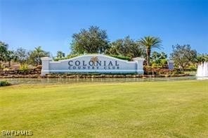 10007 Sky View Way Unit 2005, Fort Myers, FL 33913 - community sign featuring a yard