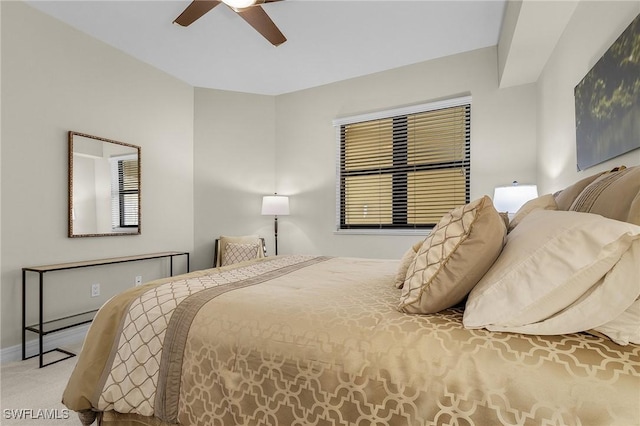 bedroom featuring carpet flooring, baseboards, and ceiling fan