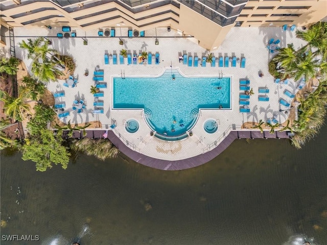 drone / aerial view with a water view