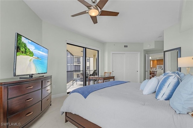bedroom with a closet, a ceiling fan, light carpet, baseboards, and visible vents