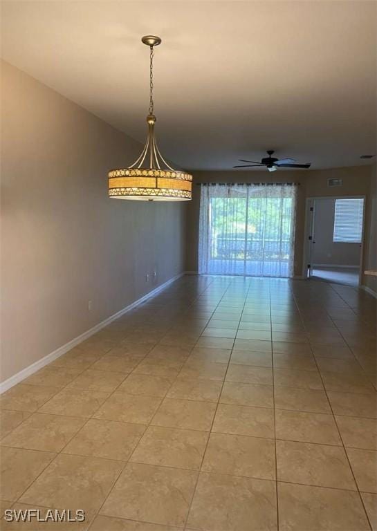13772 Cleto Dr, Estero, FL 33928 - unfurnished room featuring ceiling fan, baseboards, and light tile patterned floors