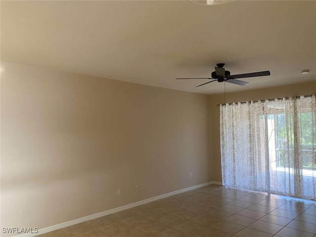 13772 Cleto Dr, Estero, FL 33928 - unfurnished room featuring ceiling fan, light tile patterned floors, and baseboards