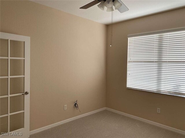 13772 Cleto Dr, Estero, FL 33928 - empty room featuring carpet, ceiling fan, and baseboards