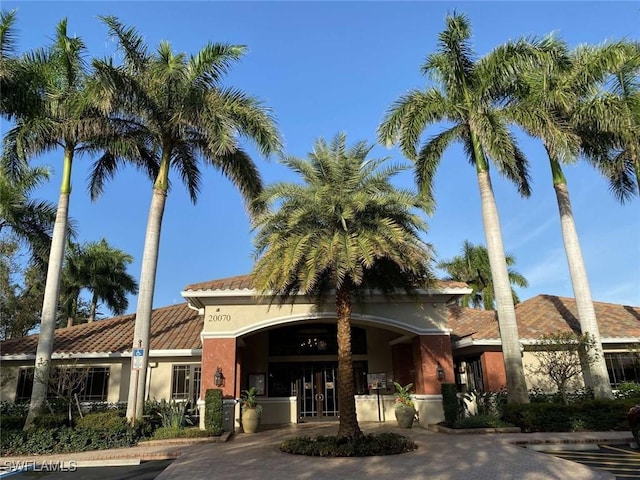 13772 Cleto Dr, Estero, FL 33928 - view of property with decorative driveway