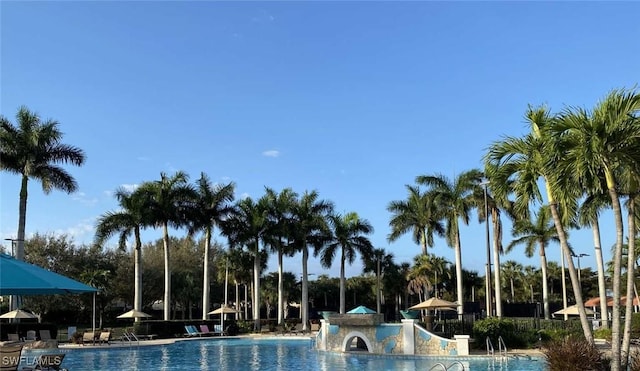 13772 Cleto Dr, Estero, FL 33928 - community pool with a patio area