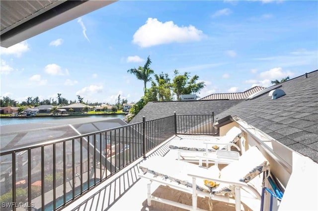 balcony featuring a water view