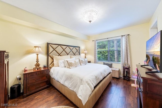 bedroom featuring dark wood-type flooring