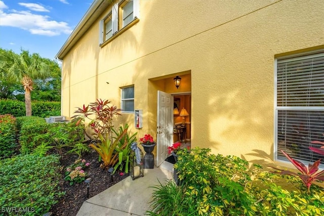 doorway to property featuring a patio