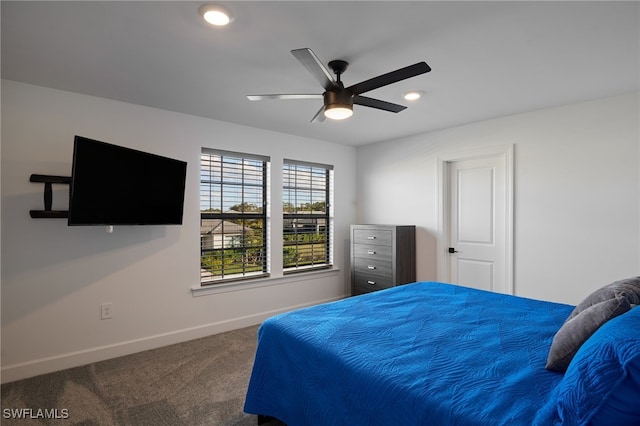 bedroom with ceiling fan and carpet floors