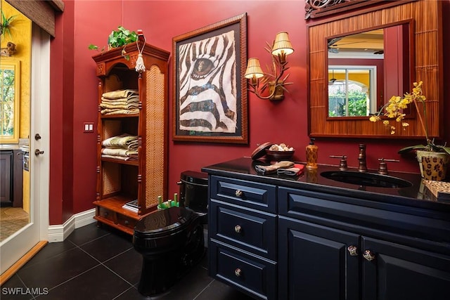 bathroom featuring tile patterned floors and vanity