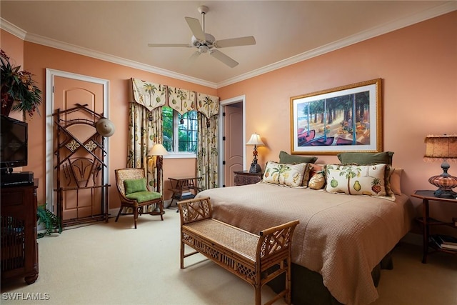 carpeted bedroom featuring crown molding and ceiling fan