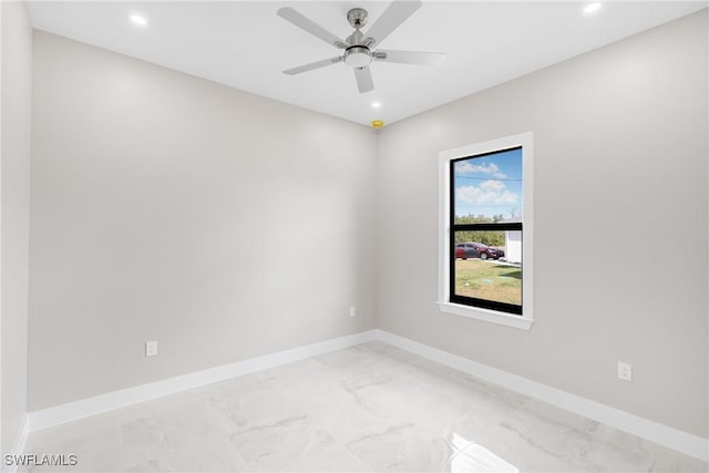 spare room featuring ceiling fan