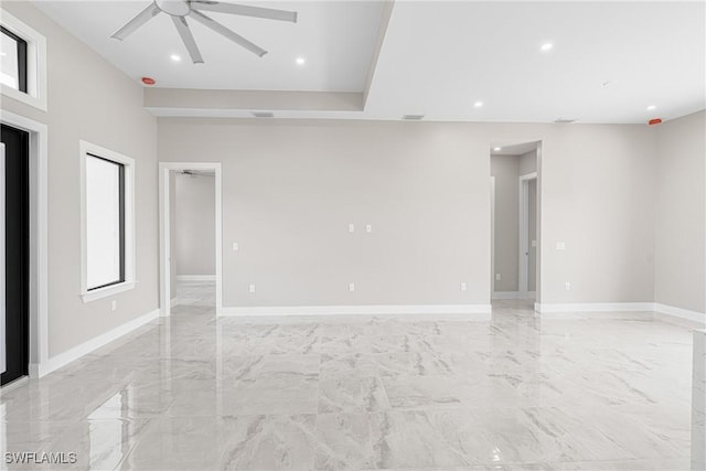 unfurnished room featuring ceiling fan