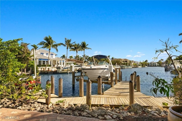 dock area featuring a water view and boat lift