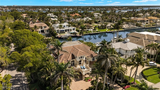 aerial view with a residential view and a water view