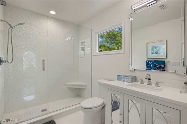 bathroom with toilet, recessed lighting, vanity, visible vents, and a shower stall