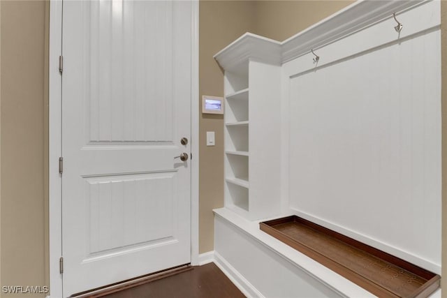 mudroom with dark hardwood / wood-style flooring