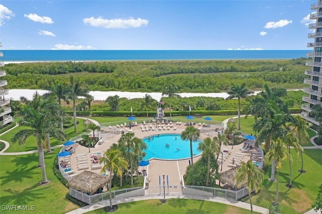 birds eye view of property featuring a water view