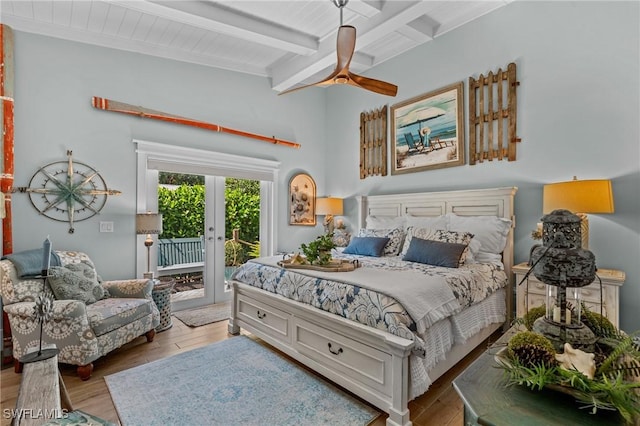 bedroom featuring french doors, a ceiling fan, wood finished floors, access to exterior, and beam ceiling