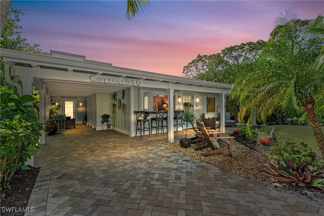 back of house featuring an outdoor hangout area and a patio