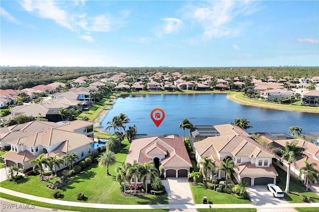 drone / aerial view with a water view