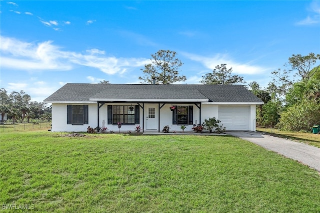 ranch-style home featuring a garage, a porch, and a front lawn