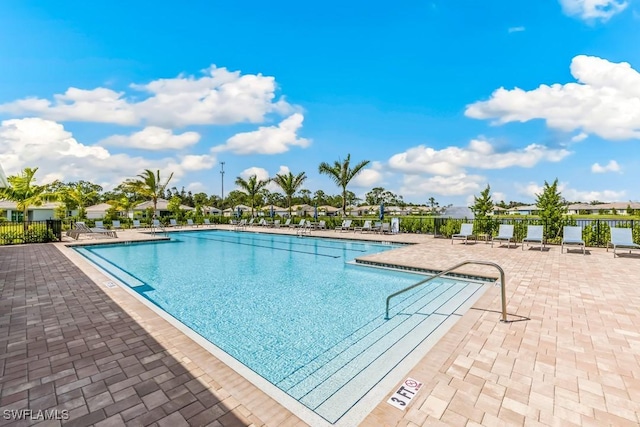 view of swimming pool featuring a patio area