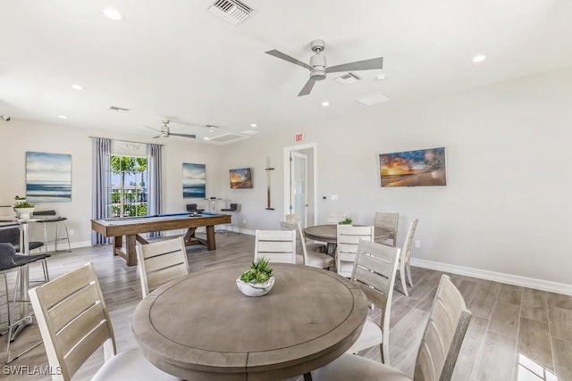 dining area with ceiling fan, billiards, and light hardwood / wood-style flooring