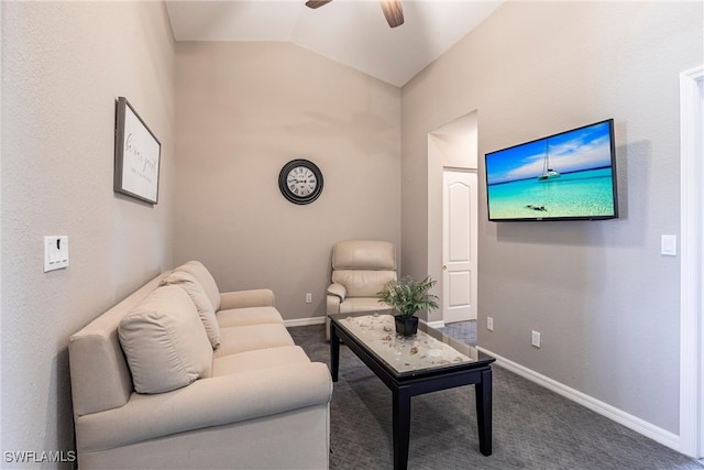 living room featuring vaulted ceiling, dark colored carpet, ceiling fan, and baseboards