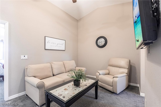 living room featuring carpet, vaulted ceiling, and baseboards