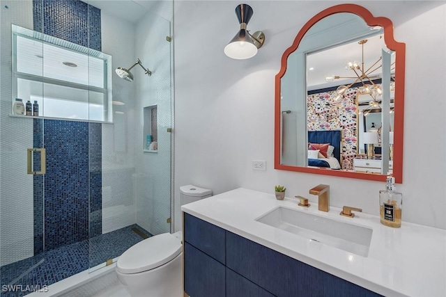 bathroom with vanity, ensuite bath, toilet, and a shower stall